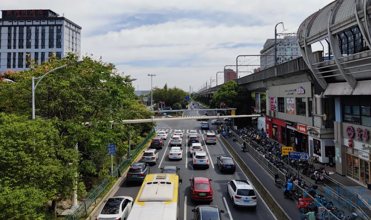 Many cars waiting at traffic lights