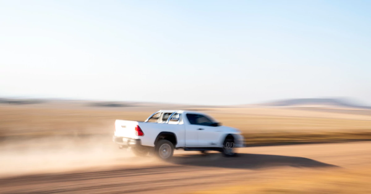 A pickup truck driving at high speed